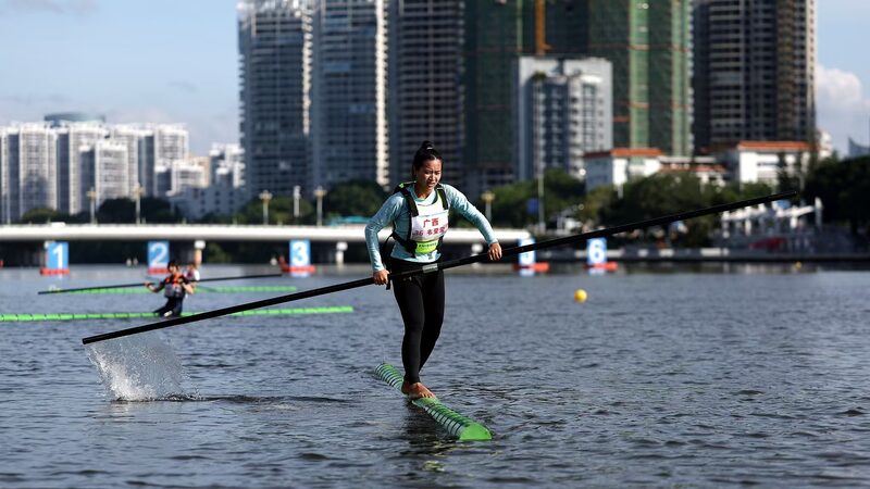 Guangxi's Lu Chuntao wins women's 60m single bamboo drifting race video poster