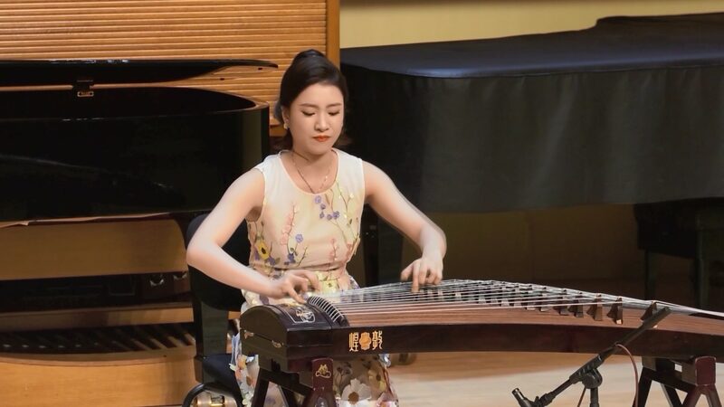 Peggy Chan: Bridging Cultures with Guzheng Music Musician Peggy Chan fetes 25th anniversary of Macao's return video poster