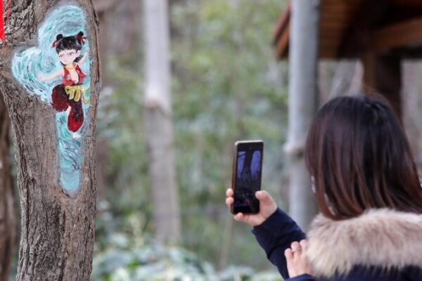 Magical ‘Ne Zha 2’ Tree Paintings Delight Visitors in Anhui Park 'Ne Zha 2' themed tree paintings wow visitors at park in China