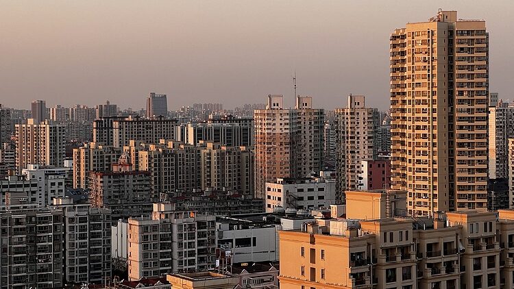 China's new policies help stabilize stock and real estate markets