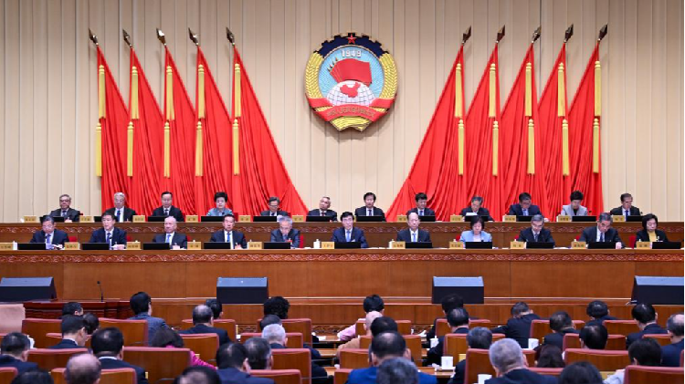 China's top political advisory body closes standing committee session