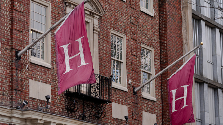 Harvard will 'not surrender' as Trump threatens foreign student ban