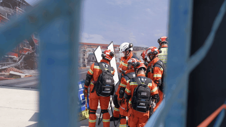 Chinese search and rescue teams pass UN reclassification video poster