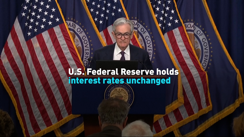 U.S. Federal Reserve holds interest rates unchanged video poster