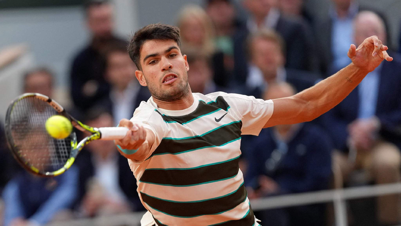 Alcaraz tops injured Paul in three sets to reach French Open last four