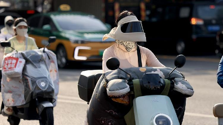 China issues alerts for rainstorms, high temperatures