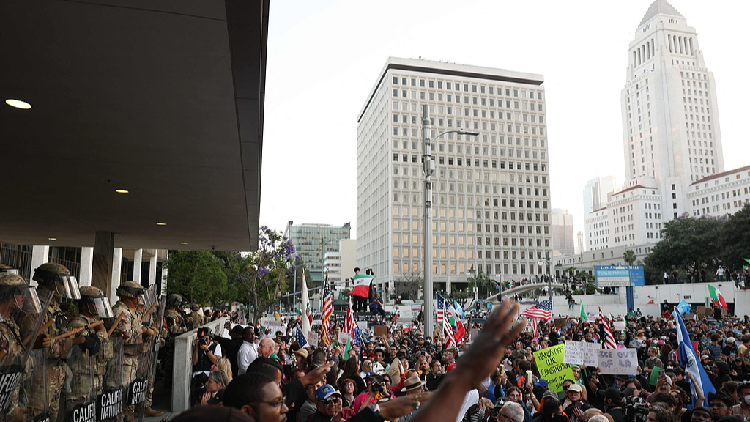 Live: Police make 'mass arrests' in LA during nighttime curfew