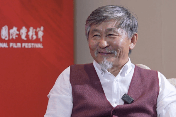 Filmmaker’s Dream: Making Movies in China! ๐ฌ Revered Kyrgyzstani filmmaker: 'Making a film in China is my dream' video poster