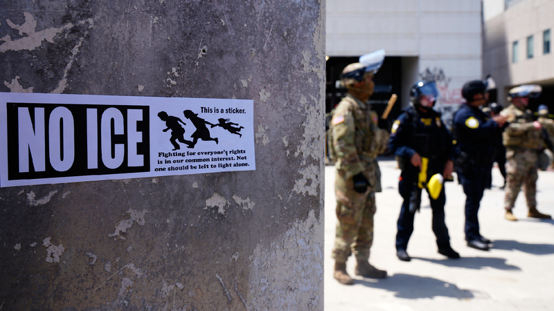 Troops in LA can detain individuals, official says, as protests spread