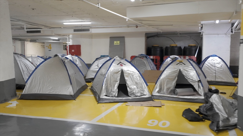 Underground_parking_lot_in_Tel_Aviv_turns_into_shelter_amid_conflict_poster - My Global News: Young Voices Underground parking lot in Tel Aviv turns into shelter amid conflict video poster