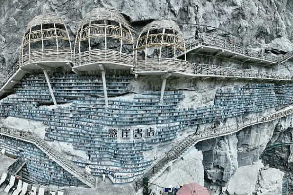Cliffside Bookstore in China Lets Readers Experience a Sinkhole Adventure! Cliffside bookstore in Guangxi turns sinkhole into cultural retreat