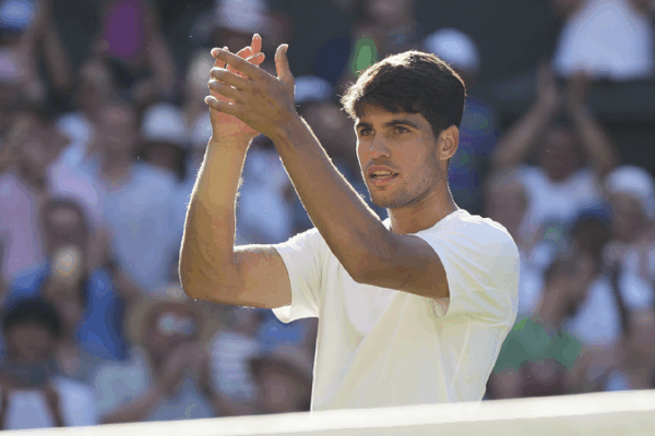 Carlos Alcaraz Battles into Second Round at Wimbledon After Five-Set Thriller Defending champion Alcaraz labors to first round victory at Wimbledon