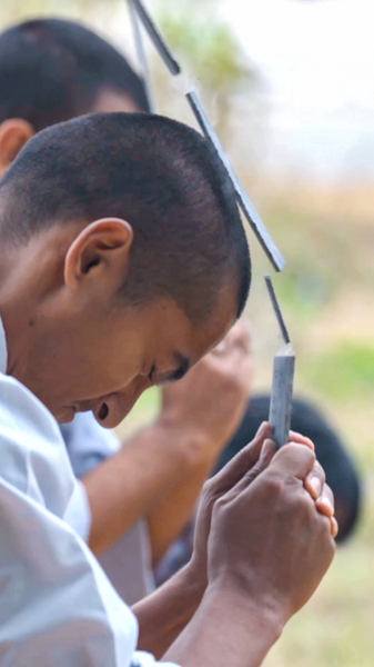 International kung fu students challenge their 'Iron Head' mastery video poster