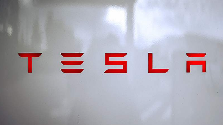 Tesla completes first driverless car delivery to customer